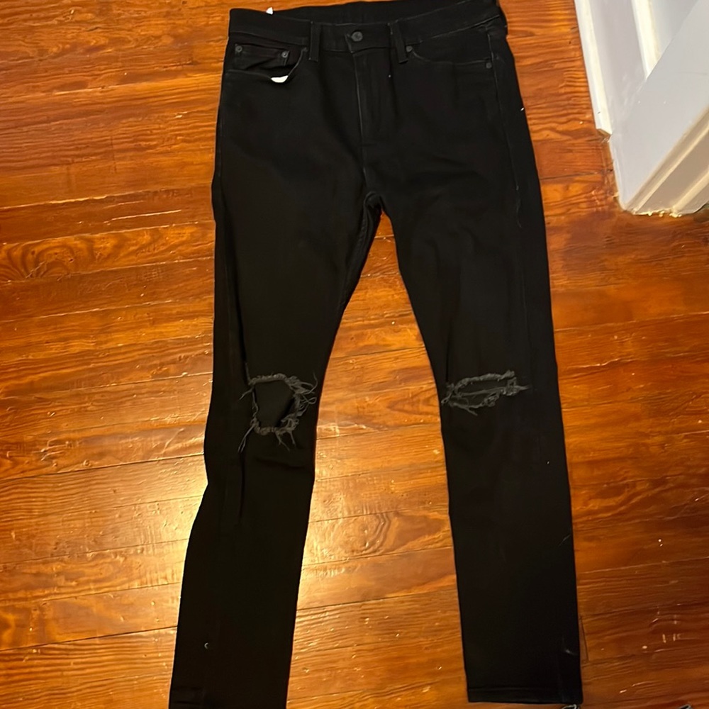 Levi black ripped jeans
